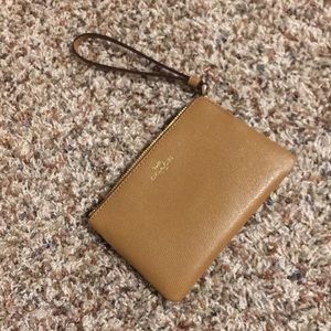 Tan coach wristlet